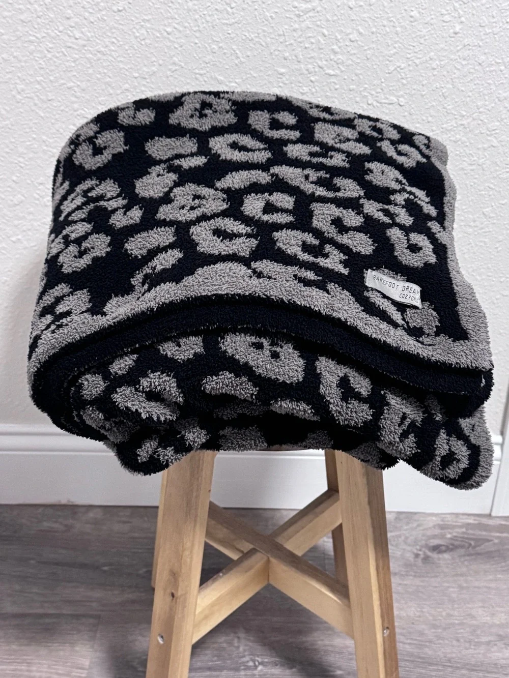 Barefoot Dreams CozyChic Barefoot in the Wild Throw Blanket in Charcoal Leopard
